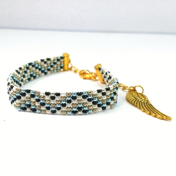 Elegant Beaded Bracelet with Angel Wing Charm - Picture 1 of 8